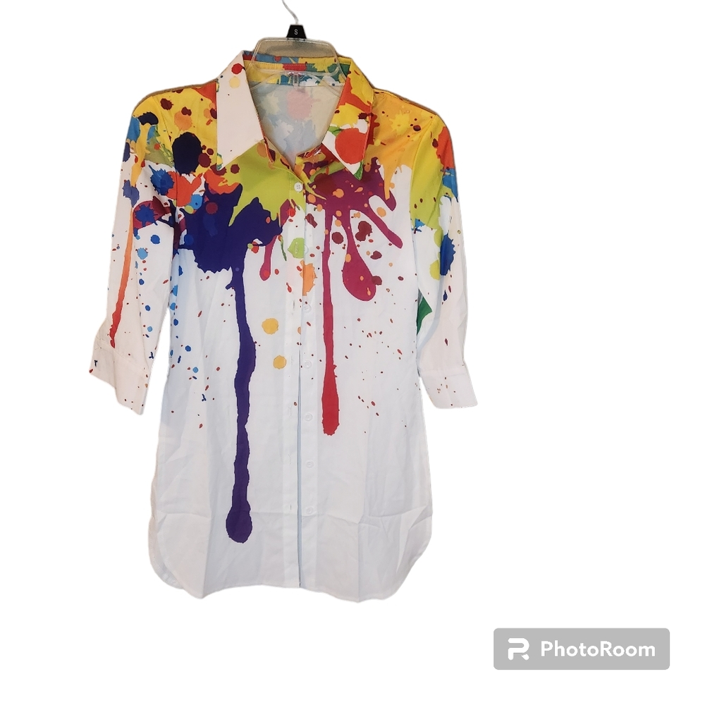 Splatter colored blouse. White background with green, purple, & orange.